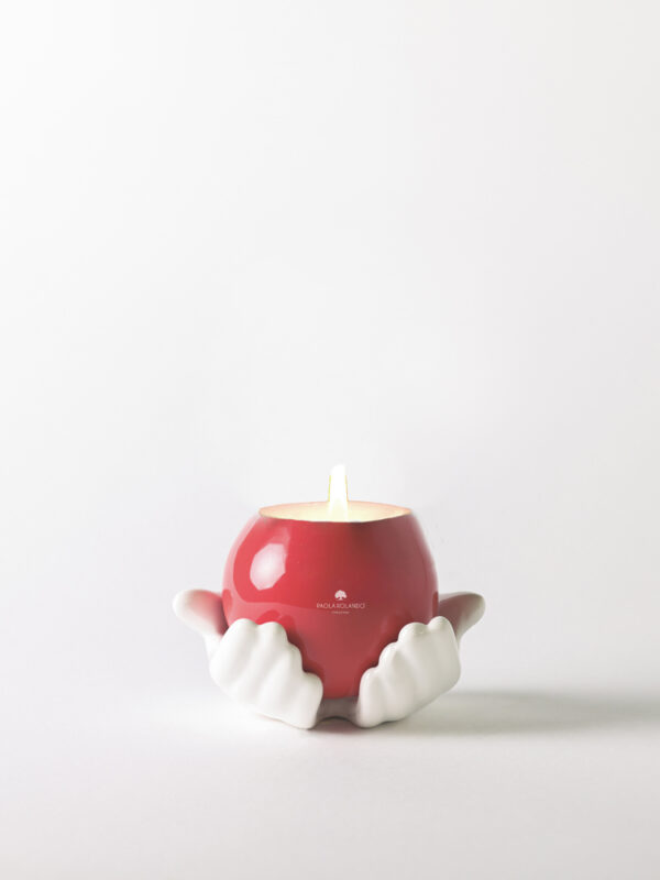 Candela in sfera tra le mani di ceramica - Margi